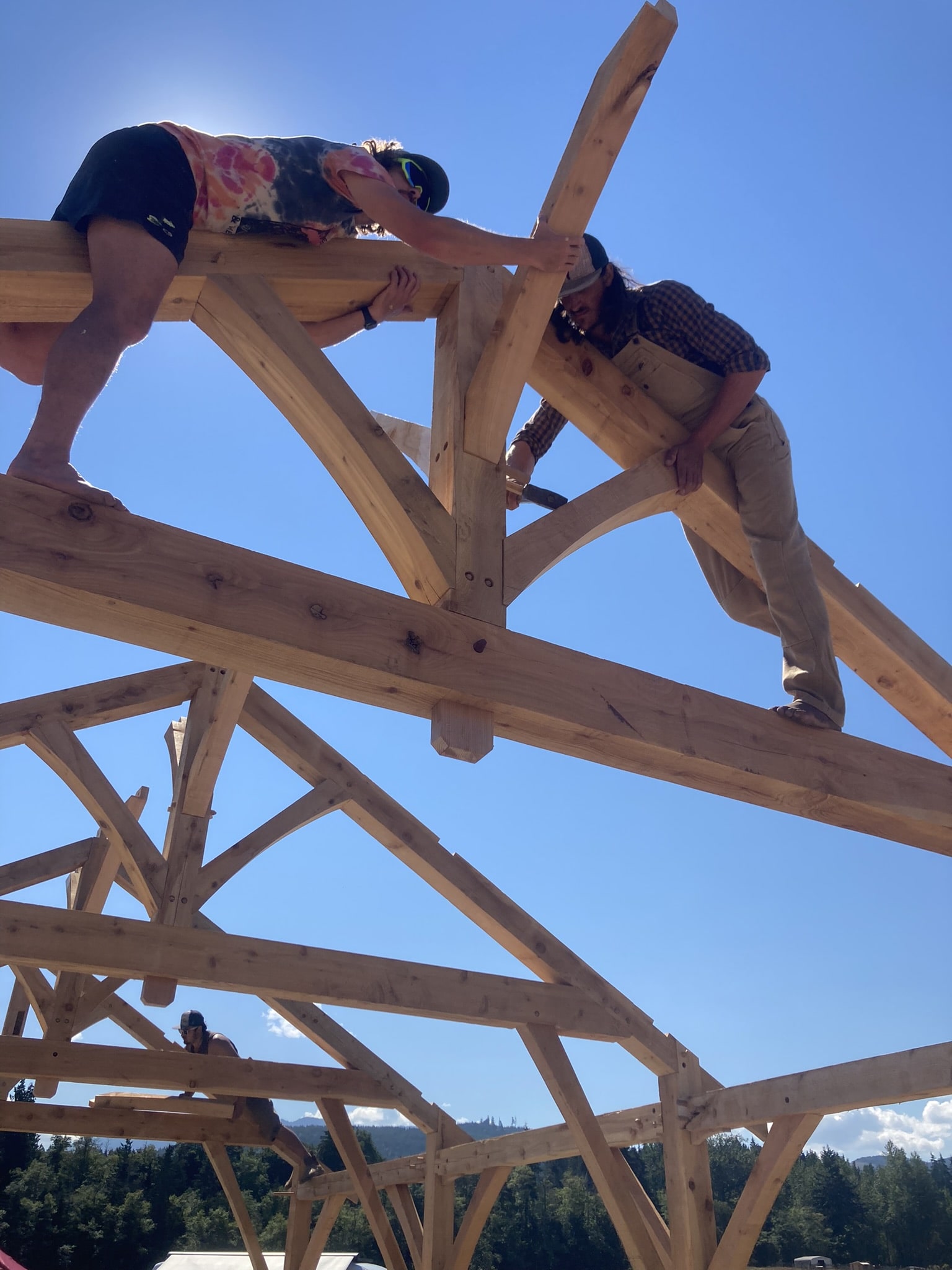 Raising trusses on a timber frame building